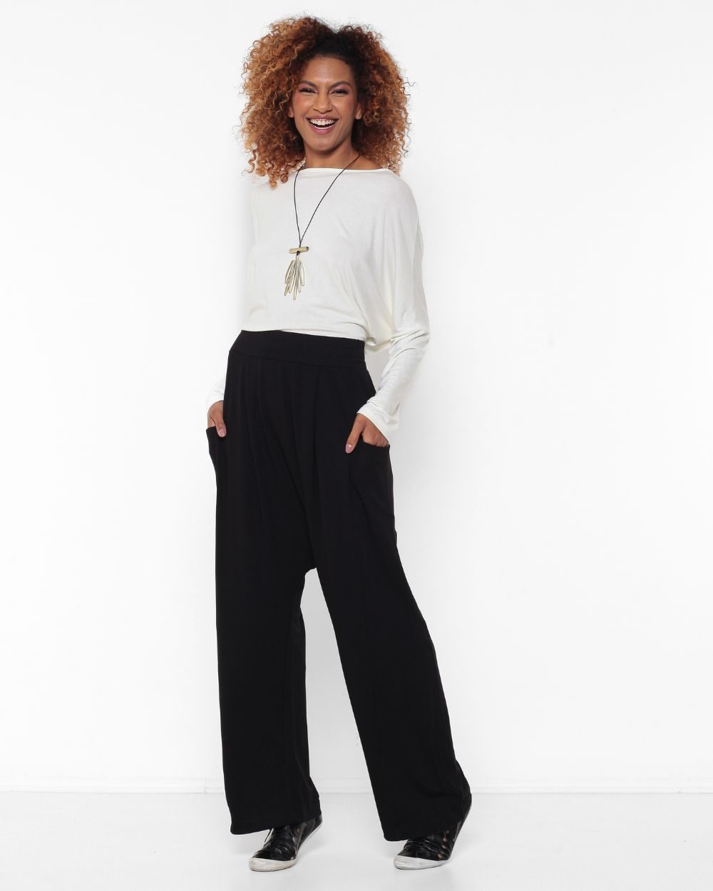 5 Calça Feminina Em Malha Com Bolsos - Imagem 1